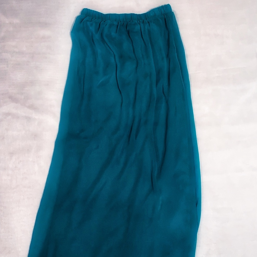 Turquoise skirt.